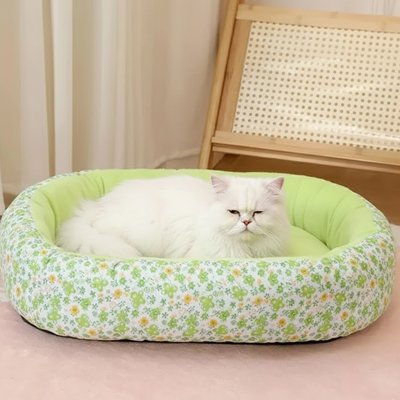 Coussin pour chat vert fleurit ovale ergonomique